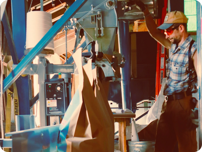 Bagging fresh feed on the line at the Red Bridge mill in Kettle Falls